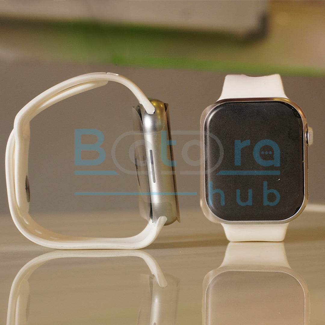 Smartwatch with a white band on a reflective surface, with 'Botta hub' branding.